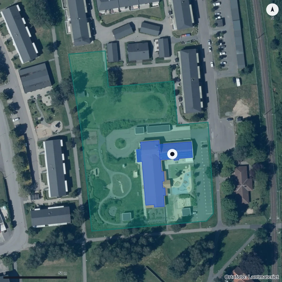 Flygbild över Utsiktens Förskola, ortofoto från Lantmäteriet