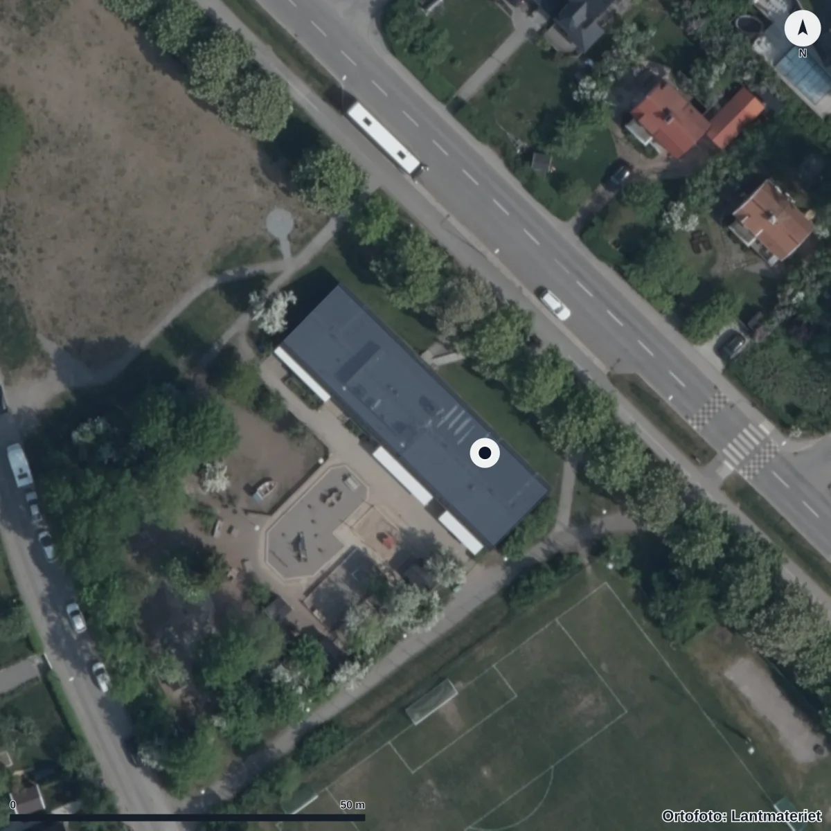 Flygbild över Förskolan Grus Och Bus, ortofoto från Lantmäteriet