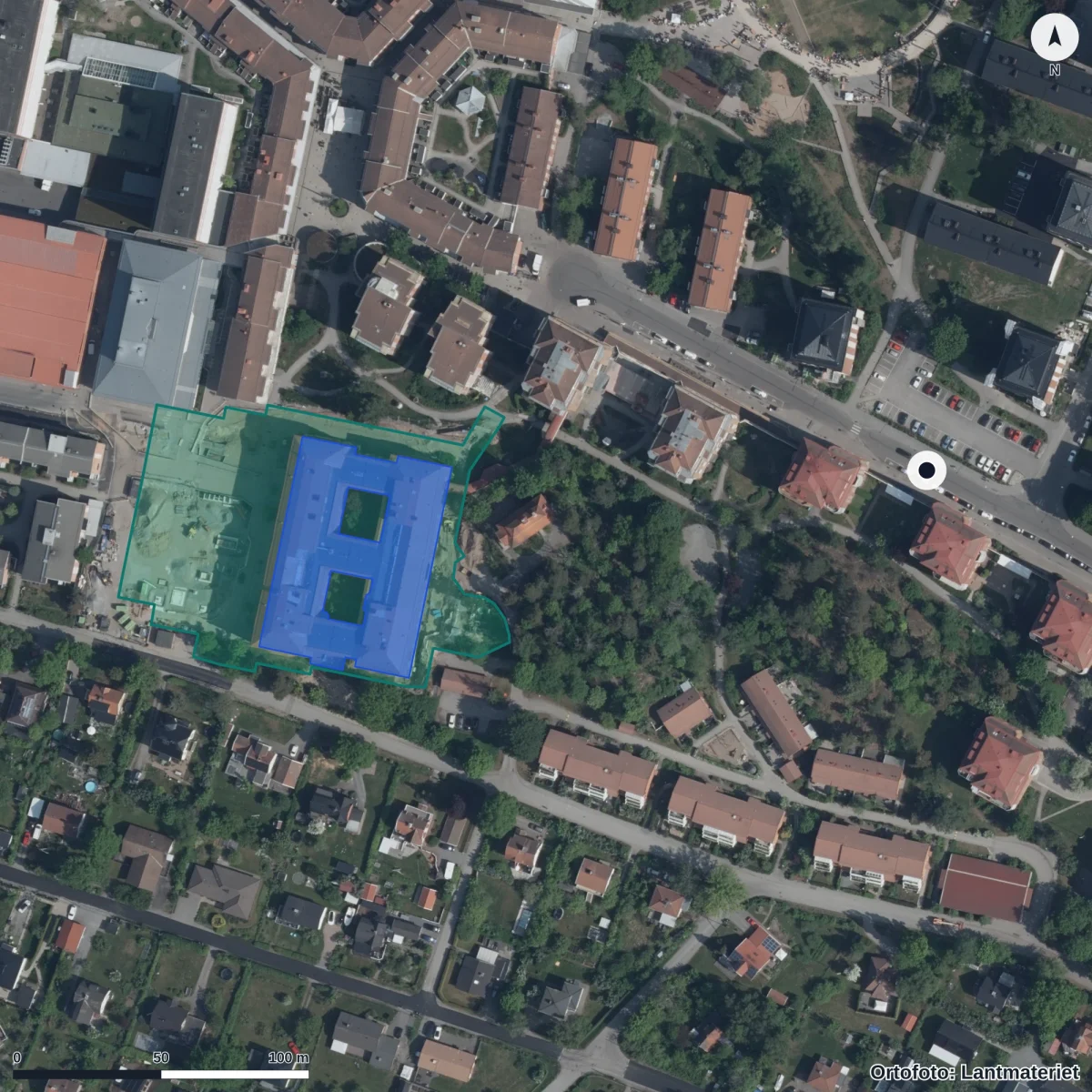 Flygbild över Montessoriförskolan Våra Barn, ortofoto från Lantmäteriet