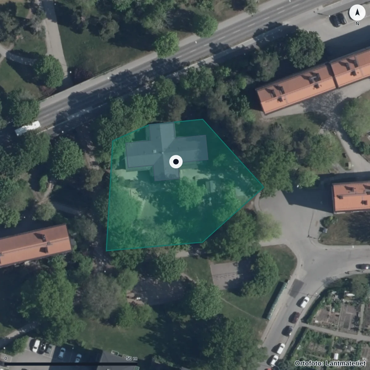 Flygbild över Förskolan Mästerkatten, ortofoto från Lantmäteriet