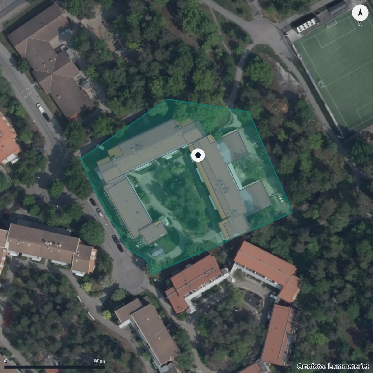 Flygbild över Förskolan Skogsgläntan, Pysslingen, ortofoto från Lantmäteriet