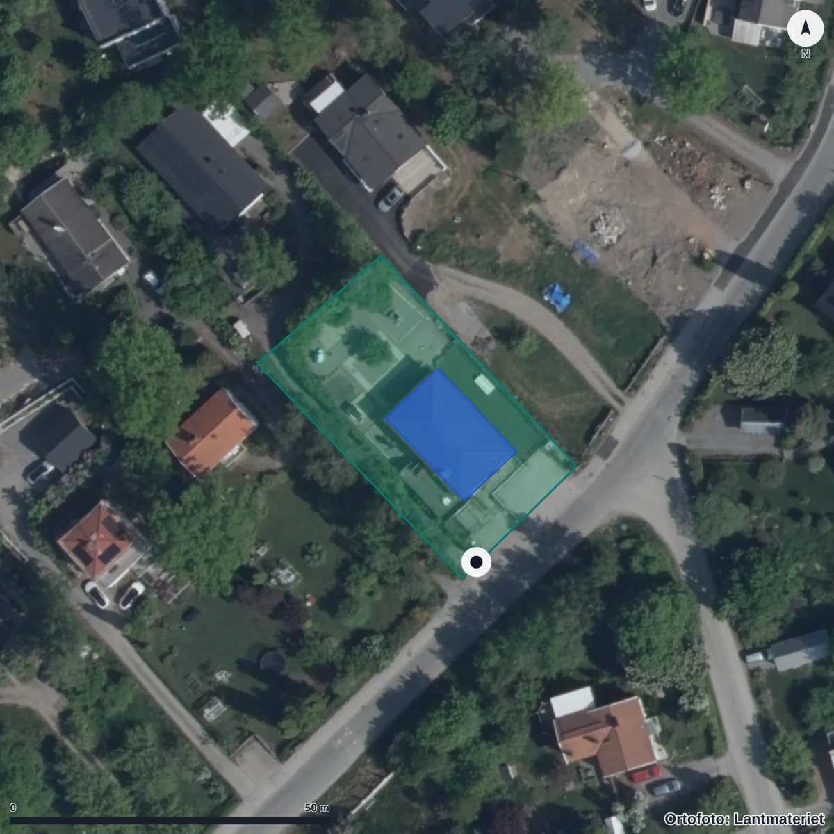 Flygbild över Förskolan Butaland Flemingsberg, ortofoto från Lantmäteriet