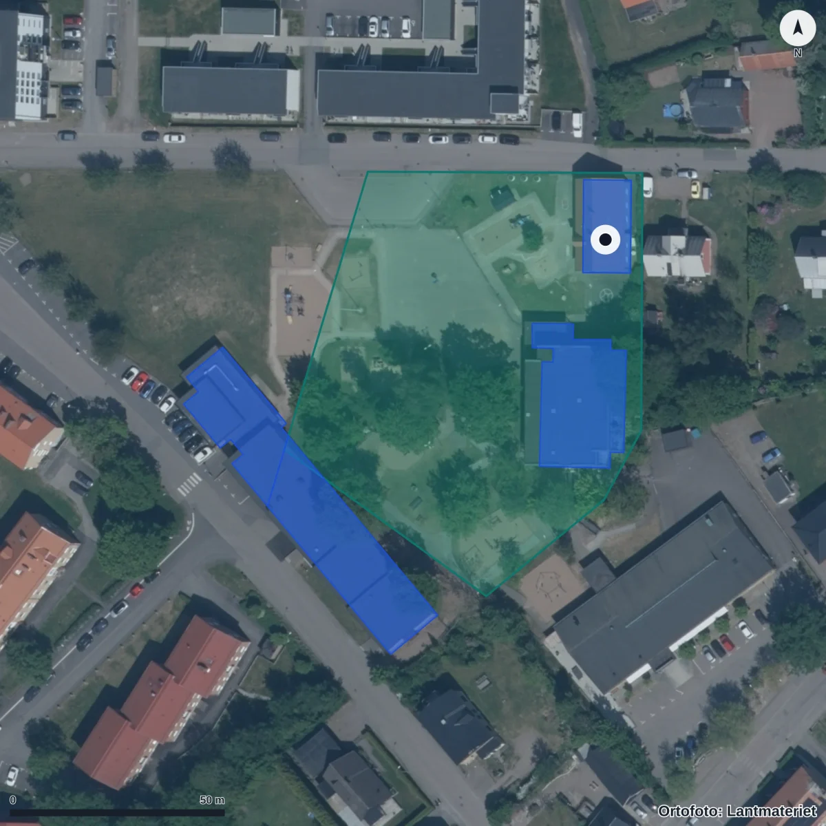 Flygbild över Borstensmontessori Förskola, ortofoto från Lantmäteriet