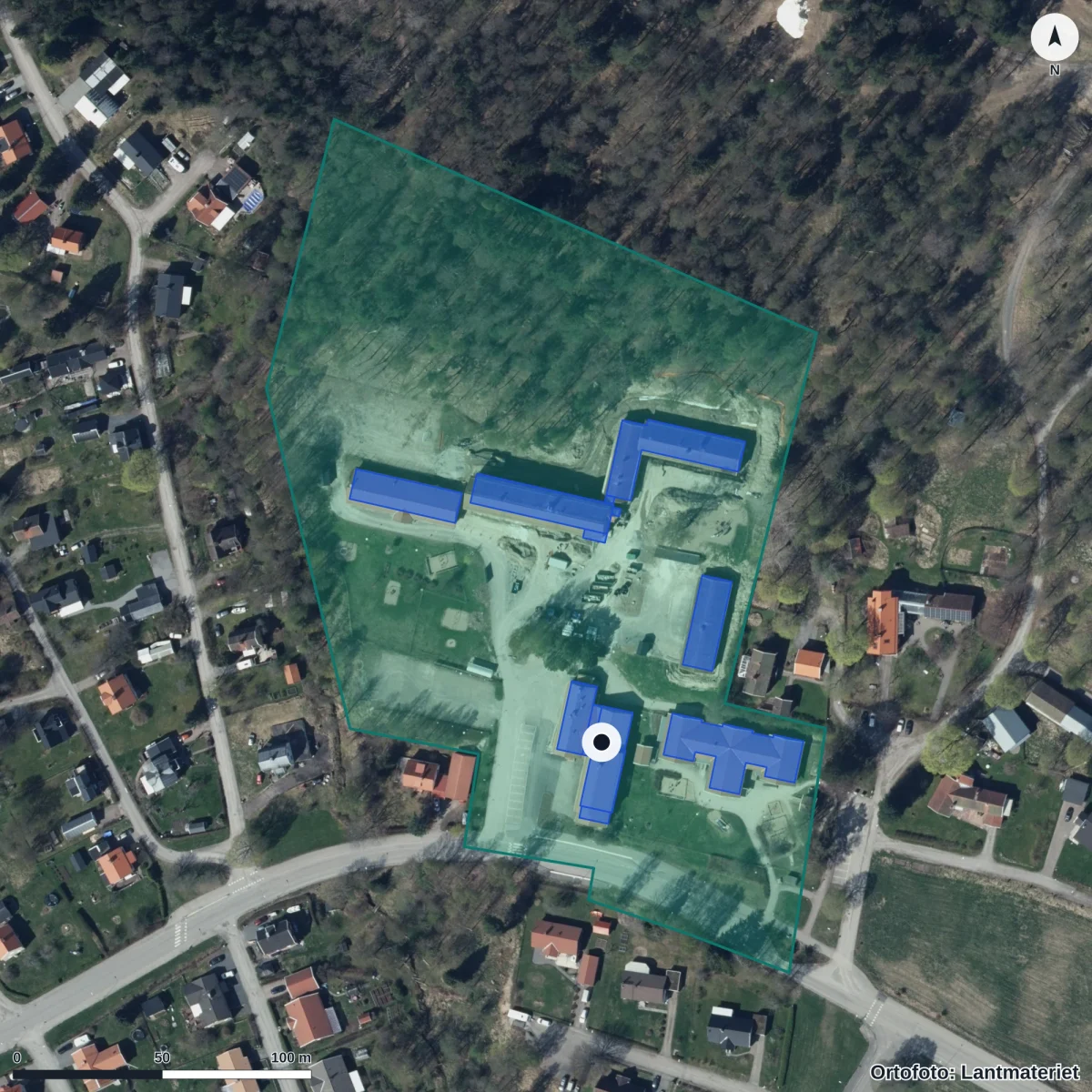 Flygbild över Förskolan Sagan, ortofoto från Lantmäteriet
