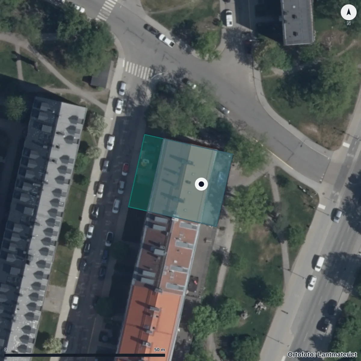 Flygbild över Norlandia Förskolor Slottsparken, ortofoto från Lantmäteriet