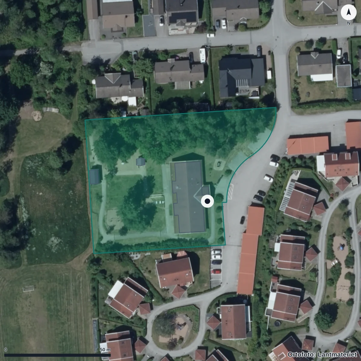 Flygbild över Snövits Förskola, ortofoto från Lantmäteriet
