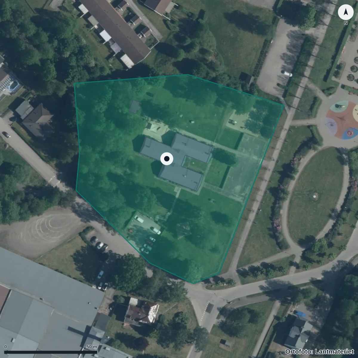 Flygbild över Förskolan Solrosen, ortofoto från Lantmäteriet