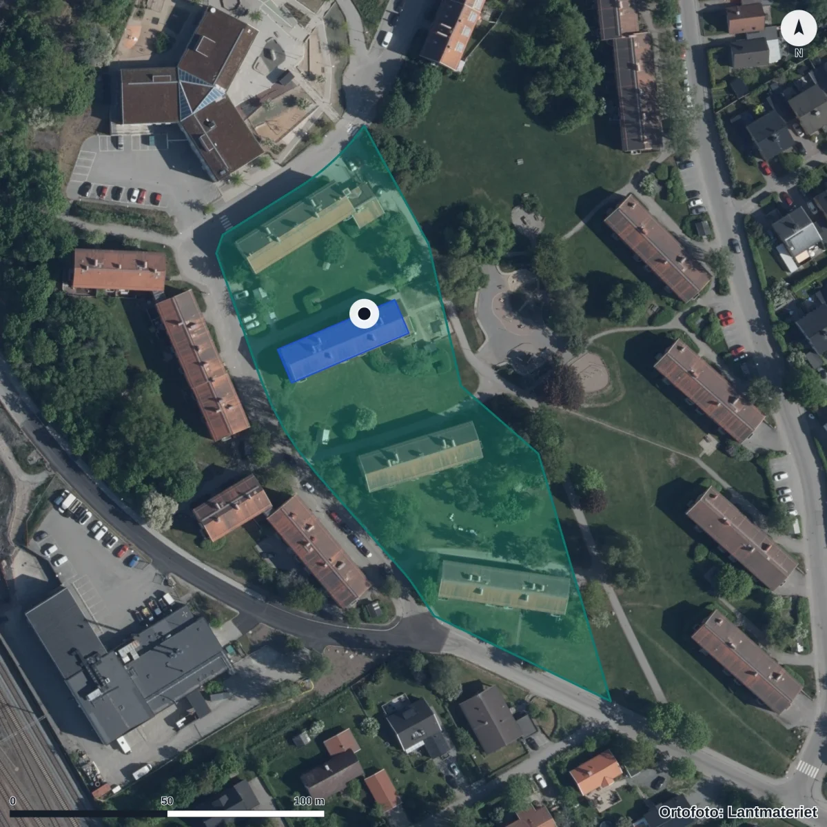 Flygbild över Förskolan Trollkungen, ortofoto från Lantmäteriet