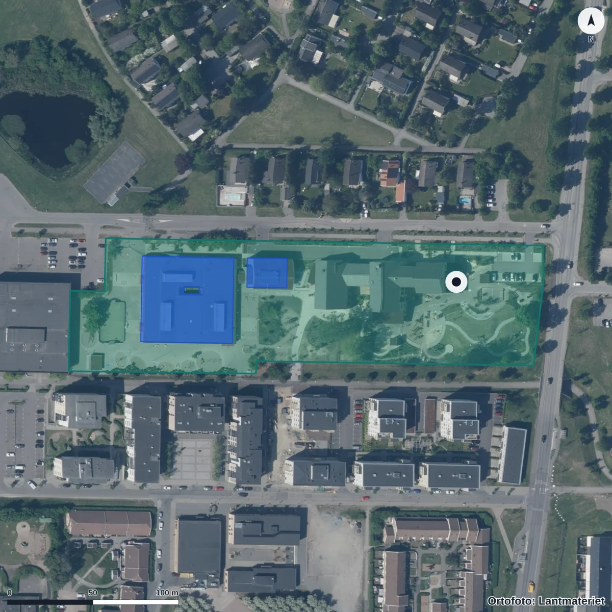 Flygbild över Hattstugans Förskola, ortofoto från Lantmäteriet