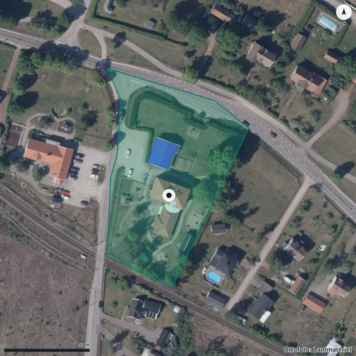 Flygbild över Förskolan Blomman, ortofoto från Lantmäteriet