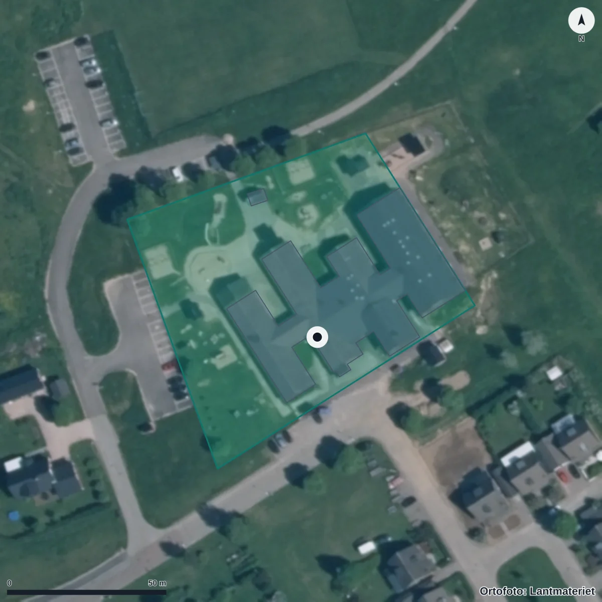 Flygbild över Förskolan Hästen, ortofoto från Lantmäteriet
