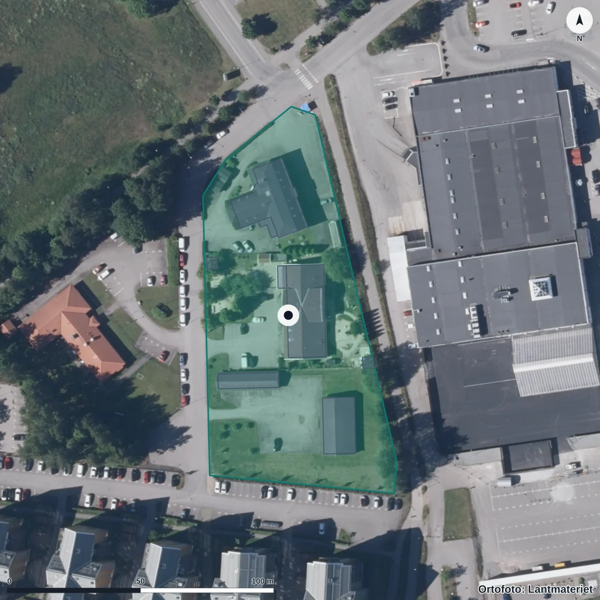 Flygbild över Skattkammarens Förskola Evedal, ortofoto från Lantmäteriet