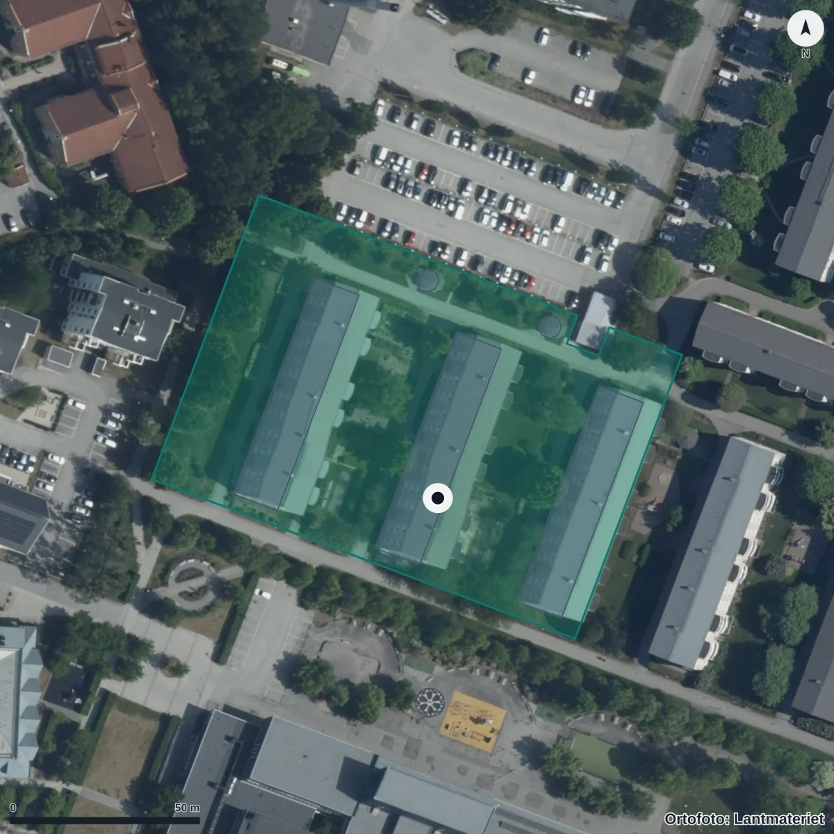Flygbild över Förskolan Axet Personalkooperativ, ortofoto från Lantmäteriet