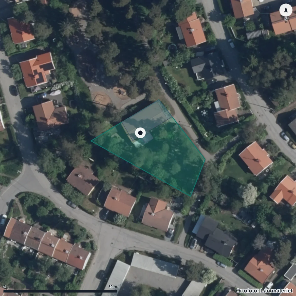 Flygbild över Förskolan I Ur Och Skur Västanvind, ortofoto från Lantmäteriet
