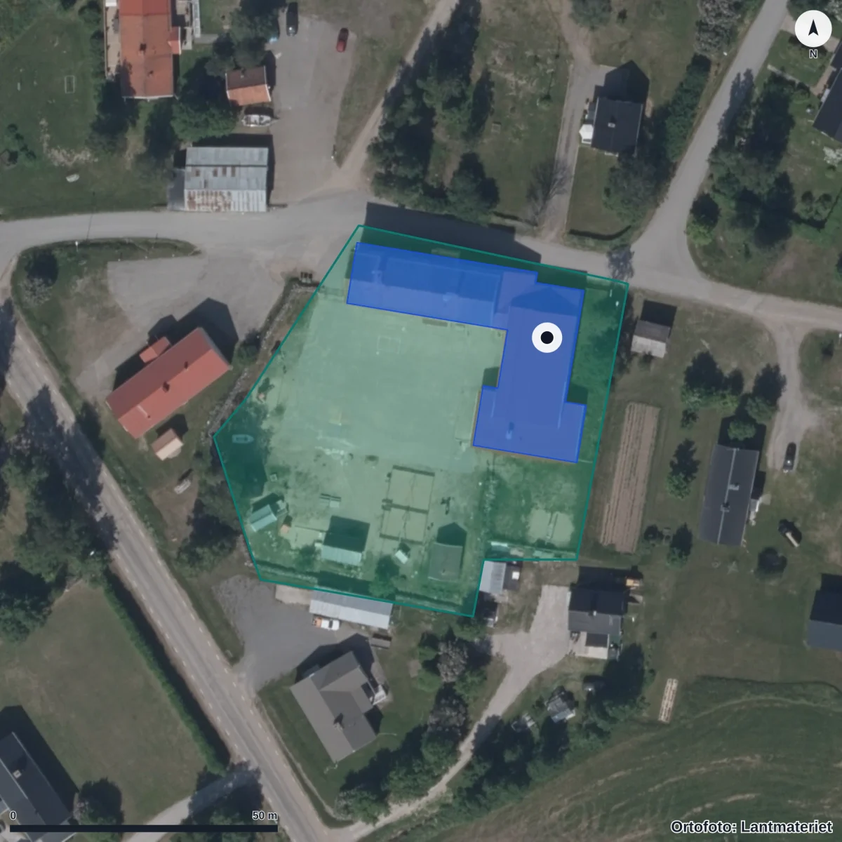 Flygbild över Pålänge Friskola, ortofoto från Lantmäteriet