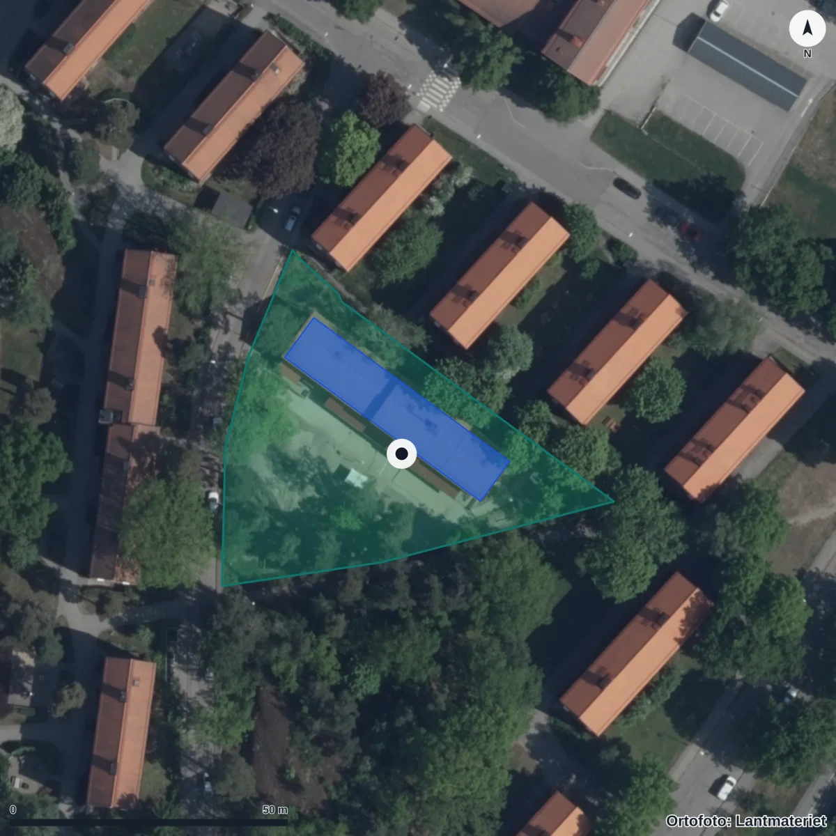 Flygbild över Förskolan Smältrullen, Pysslingen, ortofoto från Lantmäteriet