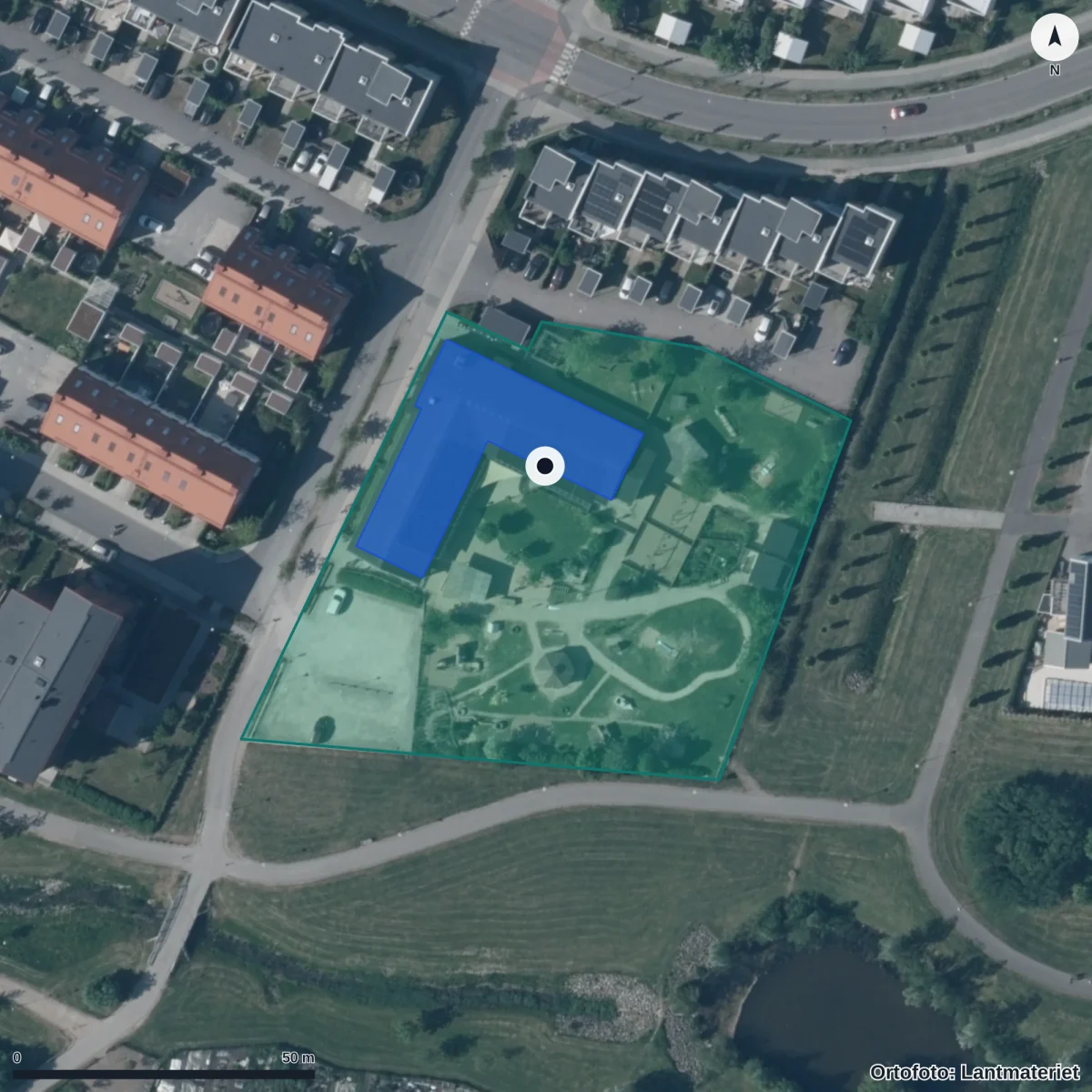 Flygbild över Montessoriförskolan Rosa Tornet I Lund Ekonomisk Förening, ortofoto från Lantmäteriet