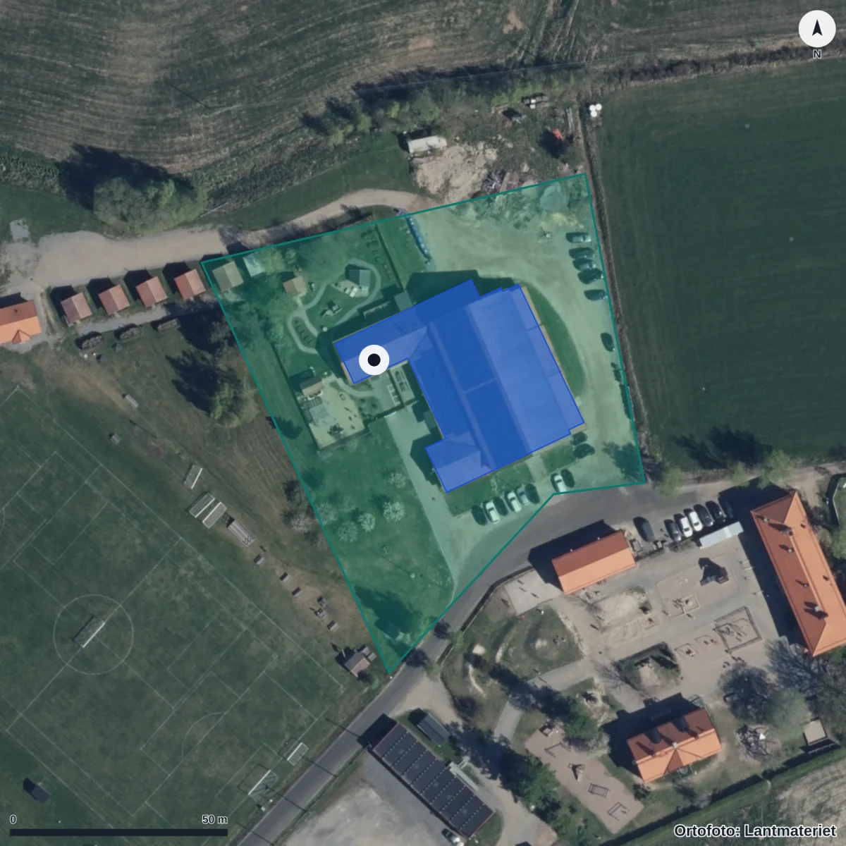 Flygbild över Åbyggeby Föräldrakooperativa Förskola, ortofoto från Lantmäteriet