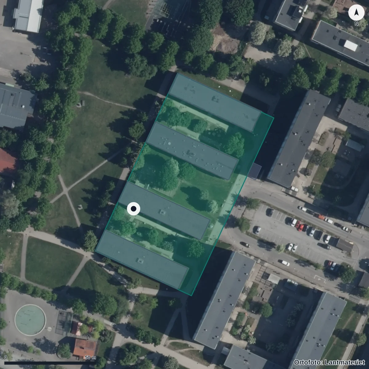 Flygbild över Förskolan Delfi, ortofoto från Lantmäteriet