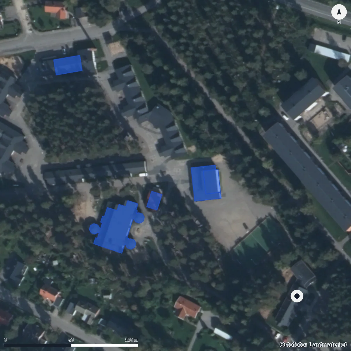 Flygbild över Förskolan Buffeln, ortofoto från Lantmäteriet