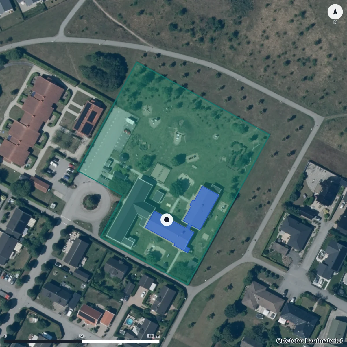 Flygbild över Källan Förskola, ortofoto från Lantmäteriet
