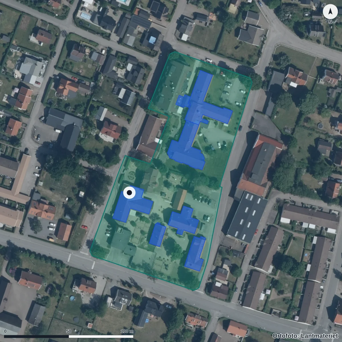 Flygbild över Fröhusets Förskola, ortofoto från Lantmäteriet