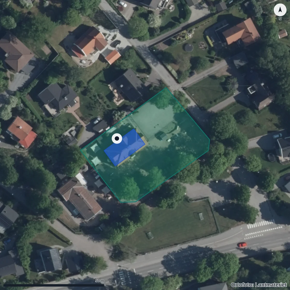 Flygbild över Förskolan Skattkistan, ortofoto från Lantmäteriet