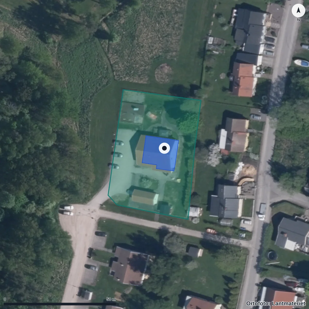 Flygbild över Tösse Förskola, ortofoto från Lantmäteriet