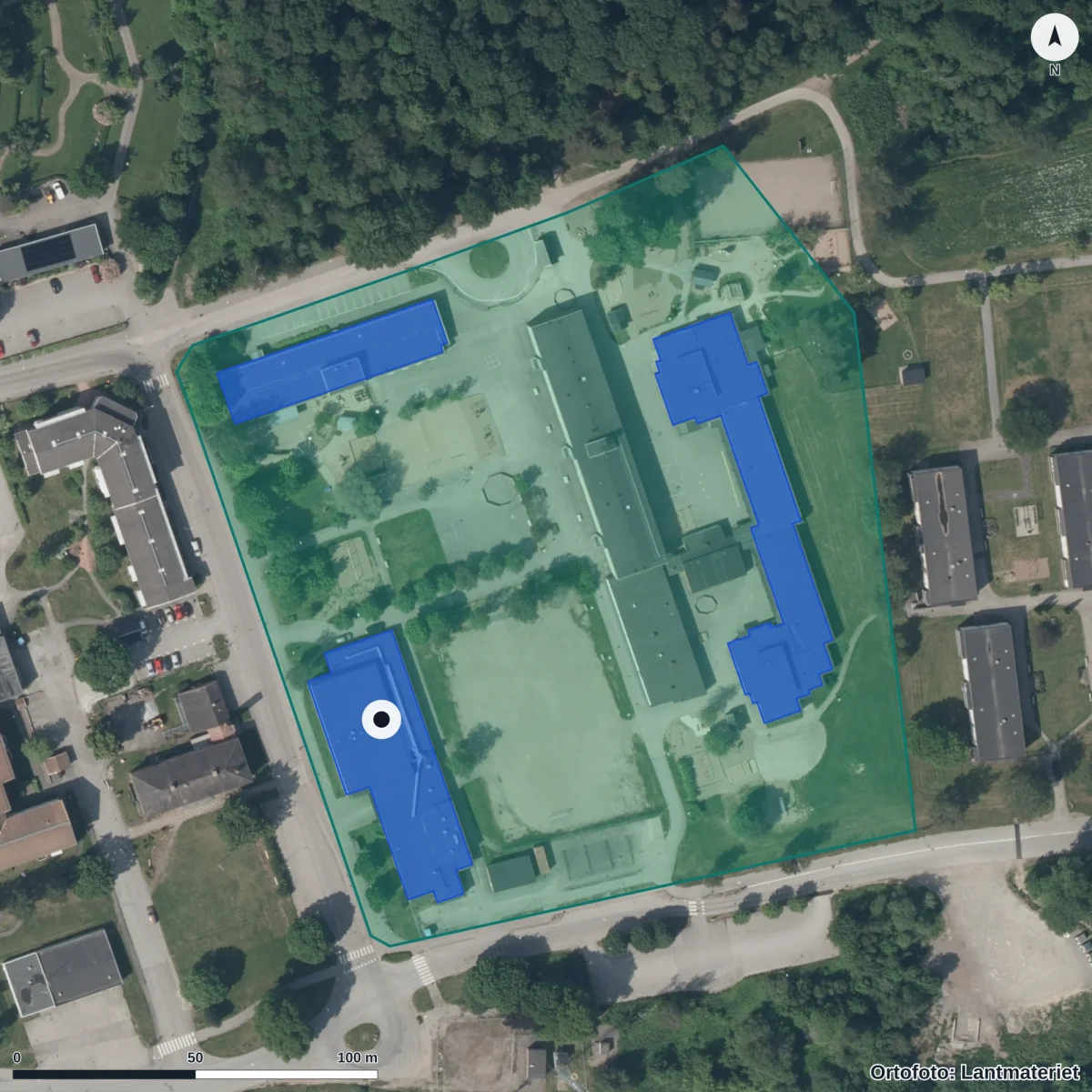 Flygbild över Förskolan Folkasbo, ortofoto från Lantmäteriet