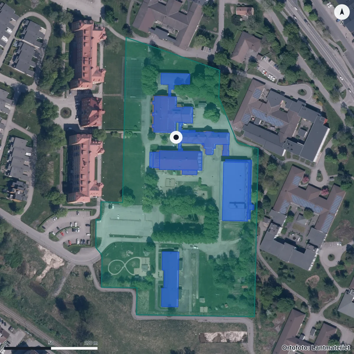 Flygbild över Fridaskolan i Vänersborg, ortofoto från Lantmäteriet