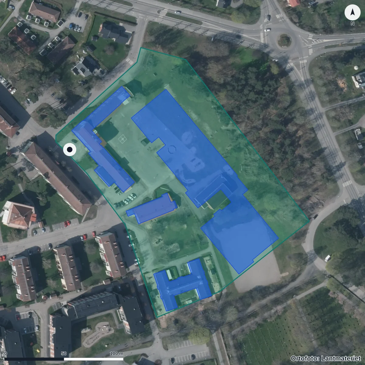 Flygbild över Malmens skola, ortofoto från Lantmäteriet