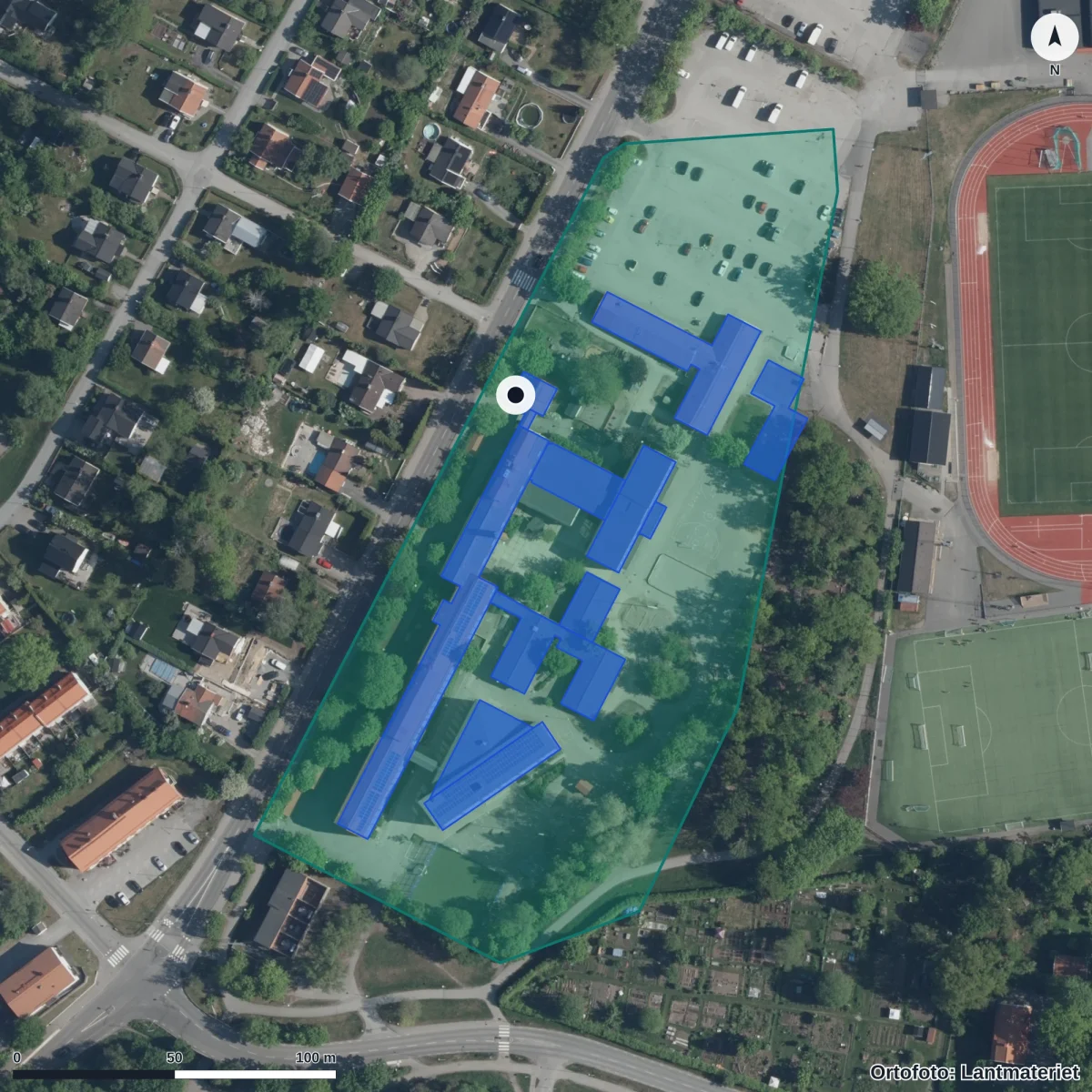 Flygbild över Ulvsättraskolan, ortofoto från Lantmäteriet