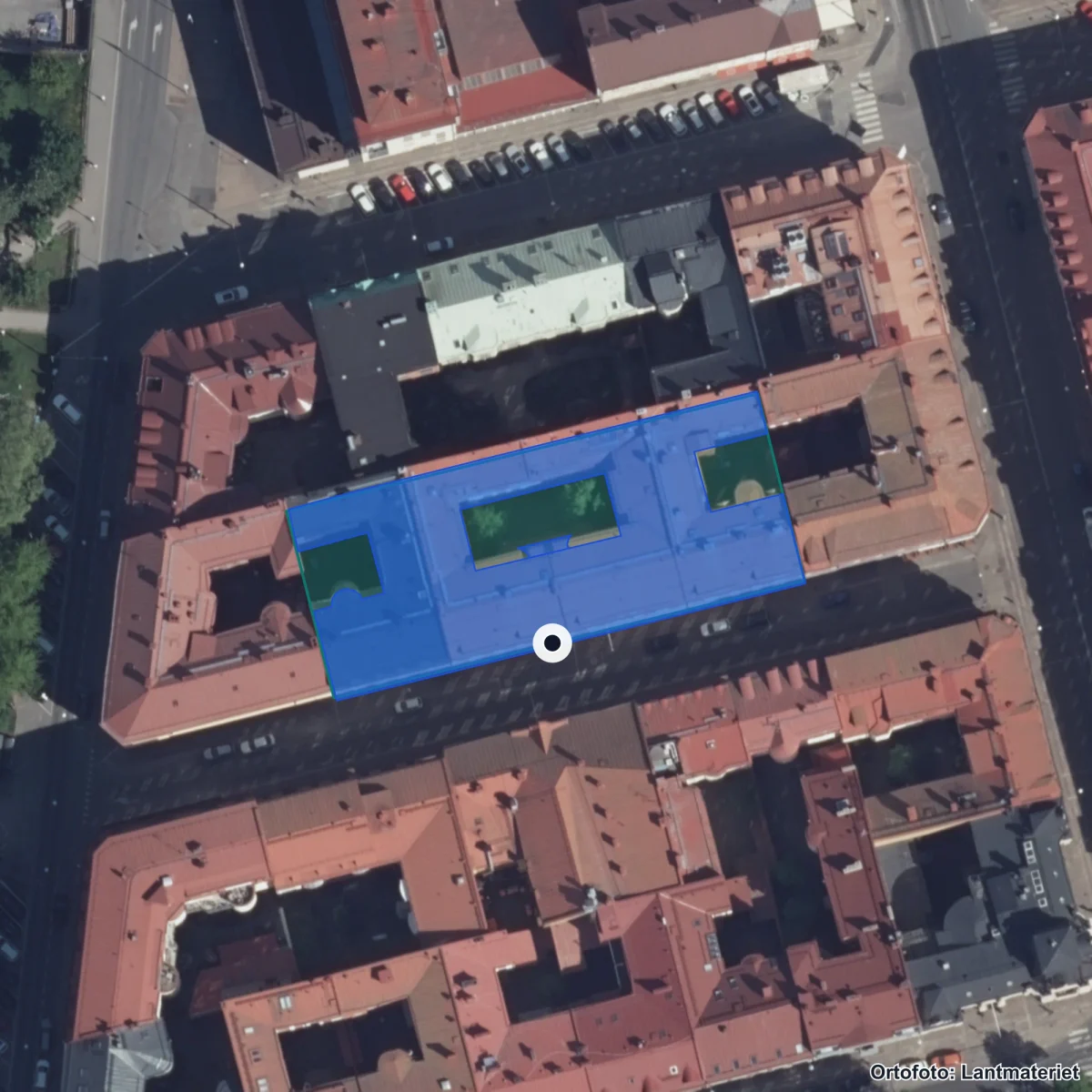 Flygbild över Sigrid Rudebecks Gymnasium, ortofoto från Lantmäteriet