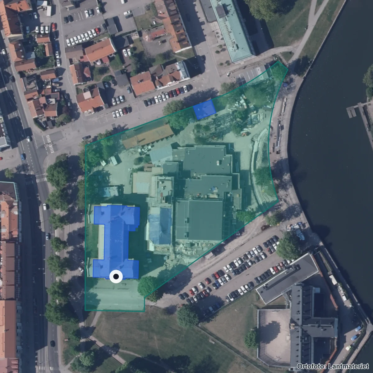 Flygbild över Central Insamlingsenhet-Skolmottagningsenheten, ortofoto från Lantmäteriet