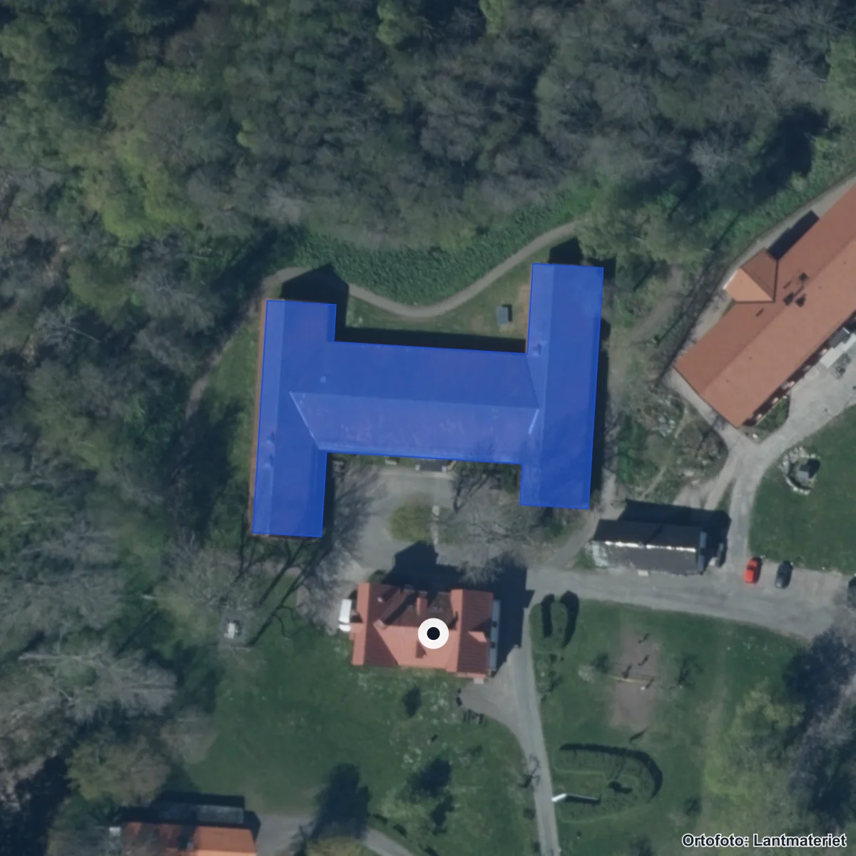 Flygbild över Vattenfallgymnasiet, ortofoto från Lantmäteriet
