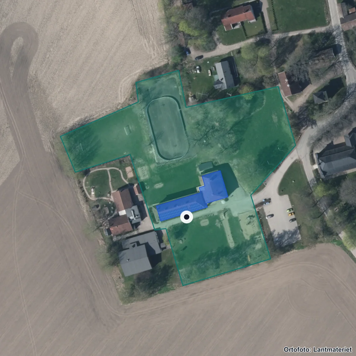 Flygbild över Österåkersbygdens friskola, ortofoto från Lantmäteriet