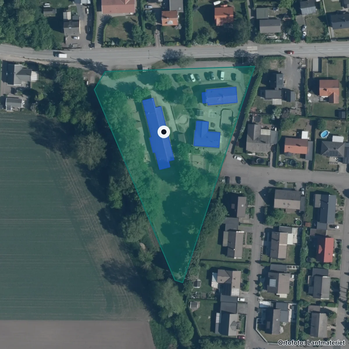 Flygbild över Wallåkrabygdens skola, ortofoto från Lantmäteriet