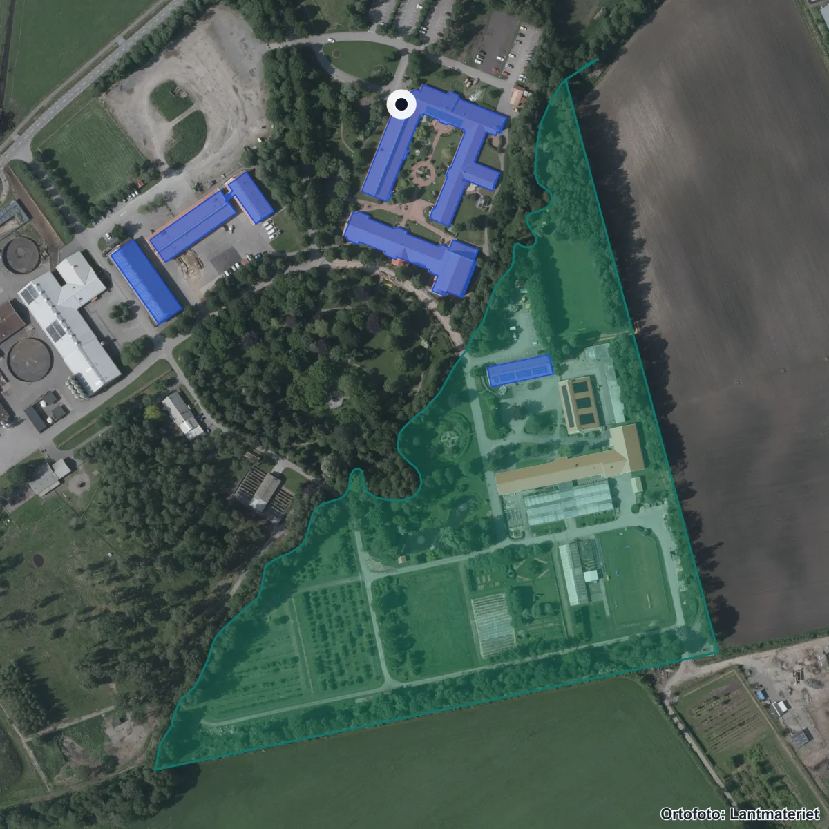 Flygbild över Munkagårdsgymnasiet, ortofoto från Lantmäteriet