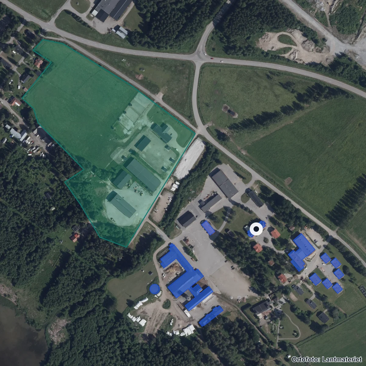 Flygbild över Grans naturbruksgymnasium, ortofoto från Lantmäteriet