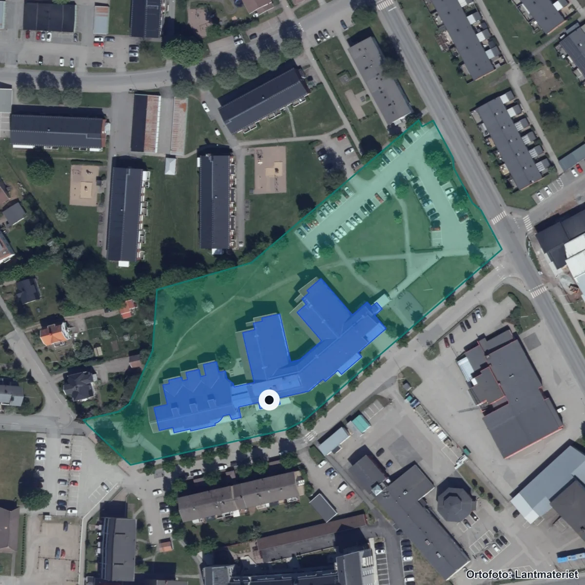 Flygbild över Sundlergymnasiet, ortofoto från Lantmäteriet