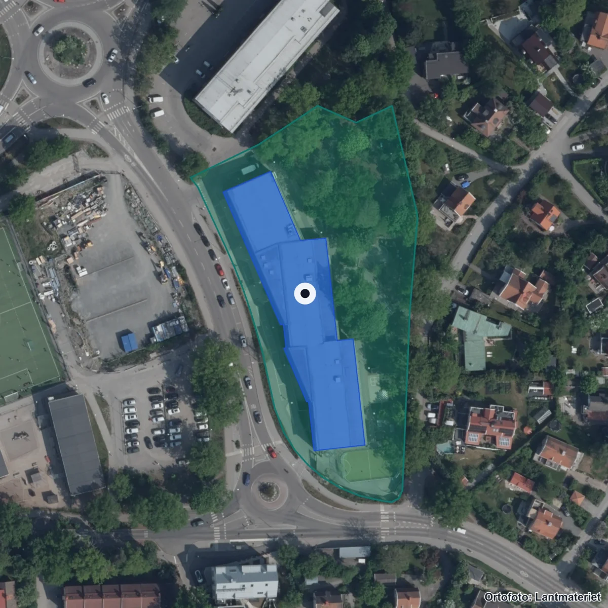 Flygbild över JENSEN grundskola Sickla, ortofoto från Lantmäteriet