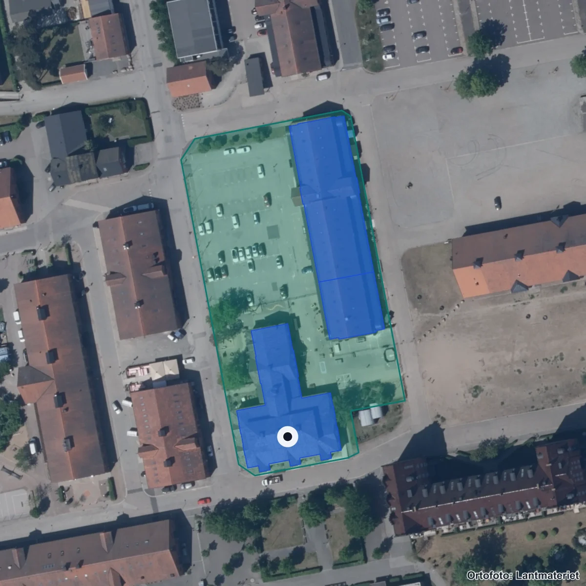 Flygbild över Montessori Mondial Sandskogen, ortofoto från Lantmäteriet