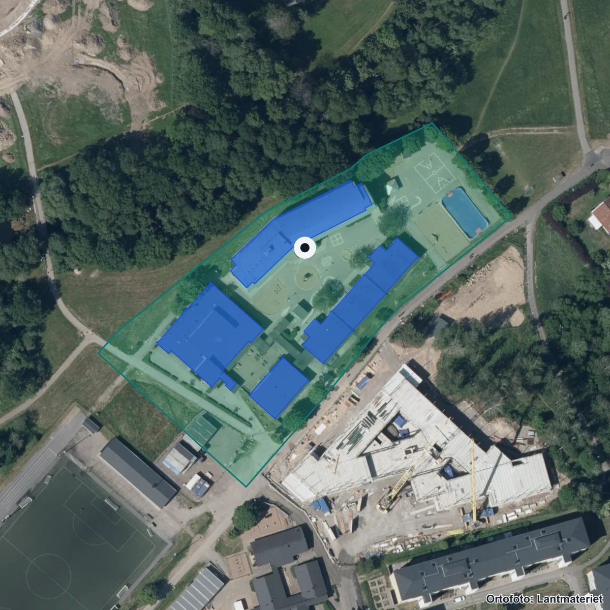 Flygbild över Bäckskolan, ortofoto från Lantmäteriet
