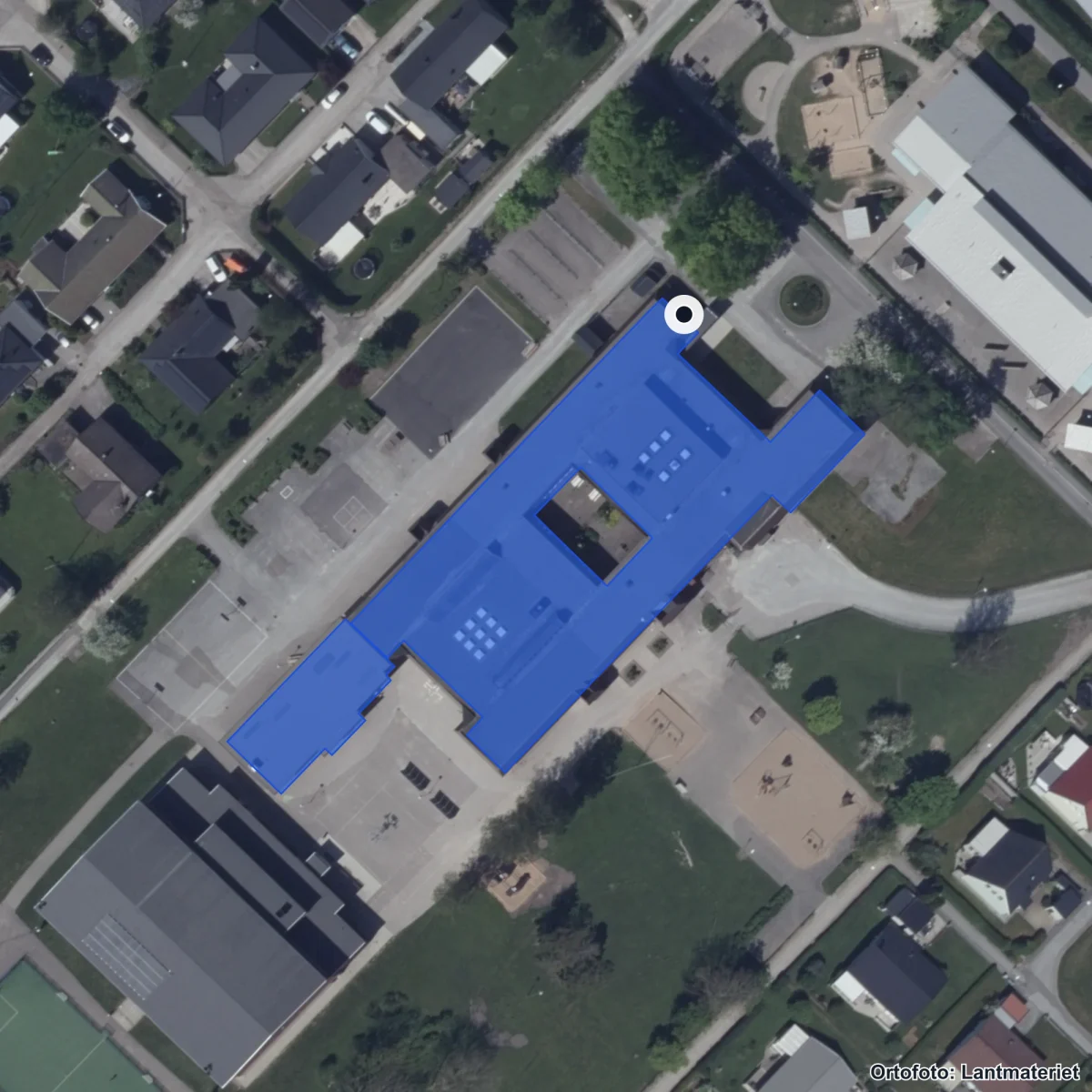 Flygbild över Kyrkenorumskolan, ortofoto från Lantmäteriet