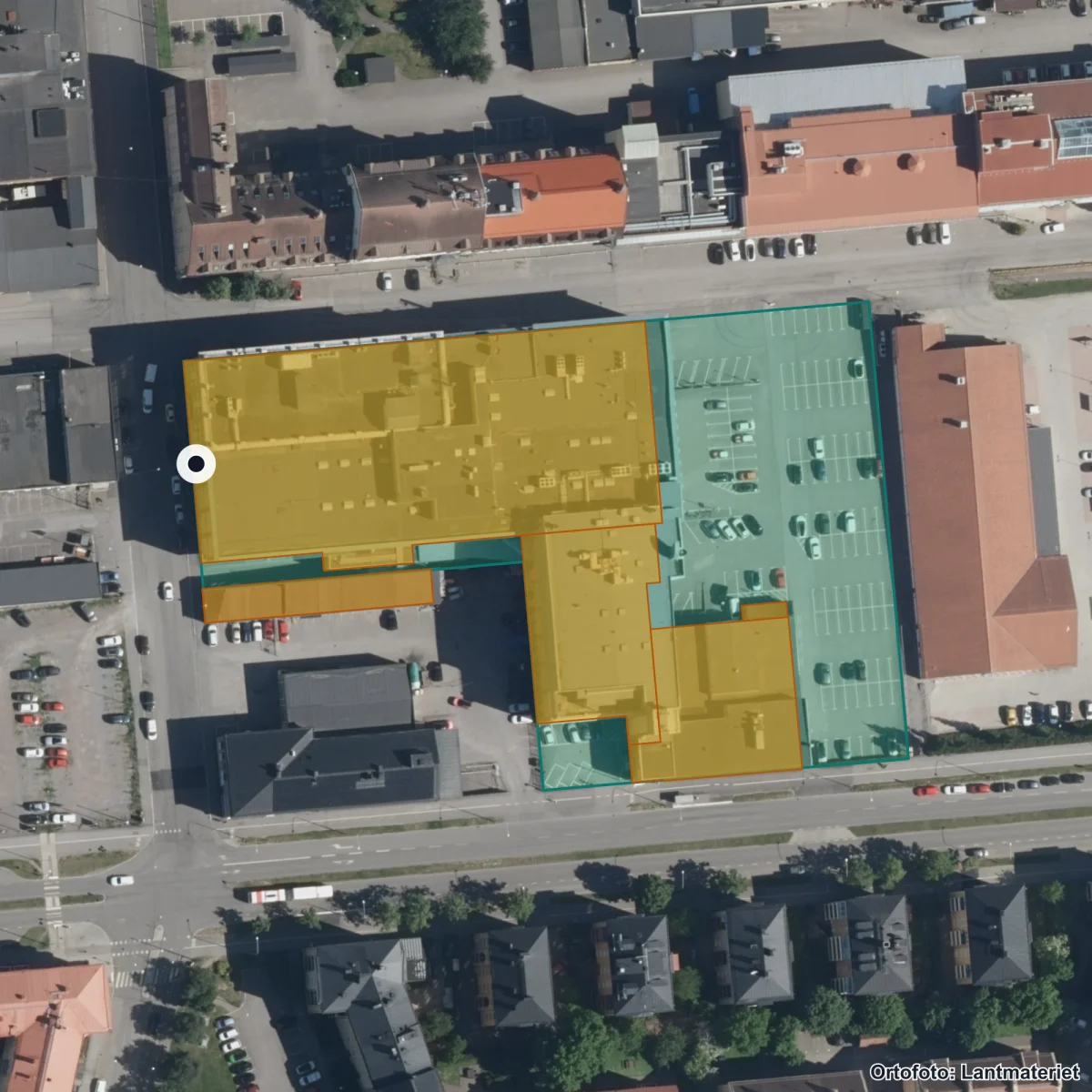 Flygbild över Praktiska Gymnasiet Norrköping, ortofoto från Lantmäteriet