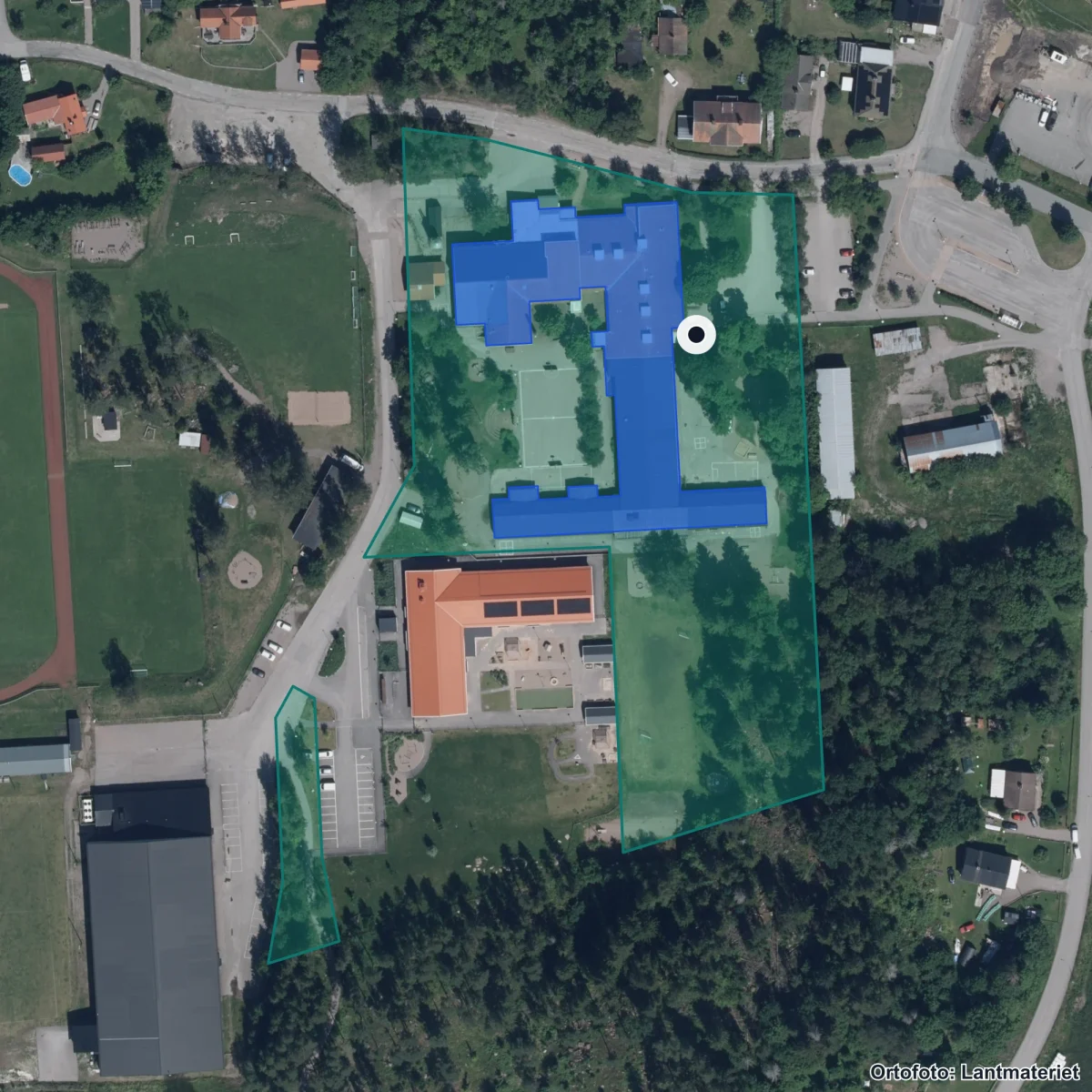 Flygbild över Ol Andersskolan, ortofoto från Lantmäteriet