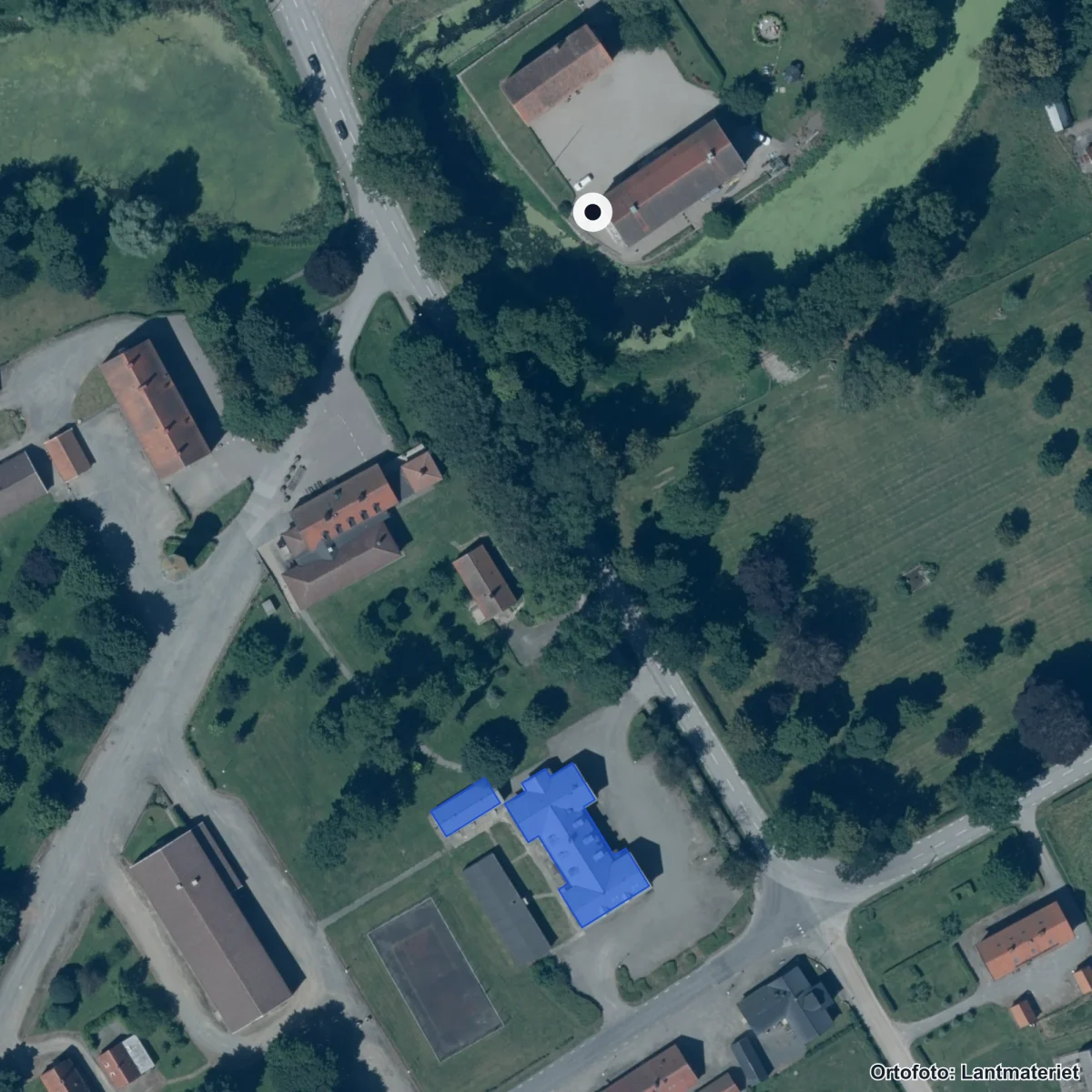 Flygbild över Bollerups Naturbruksgymnasium, ortofoto från Lantmäteriet