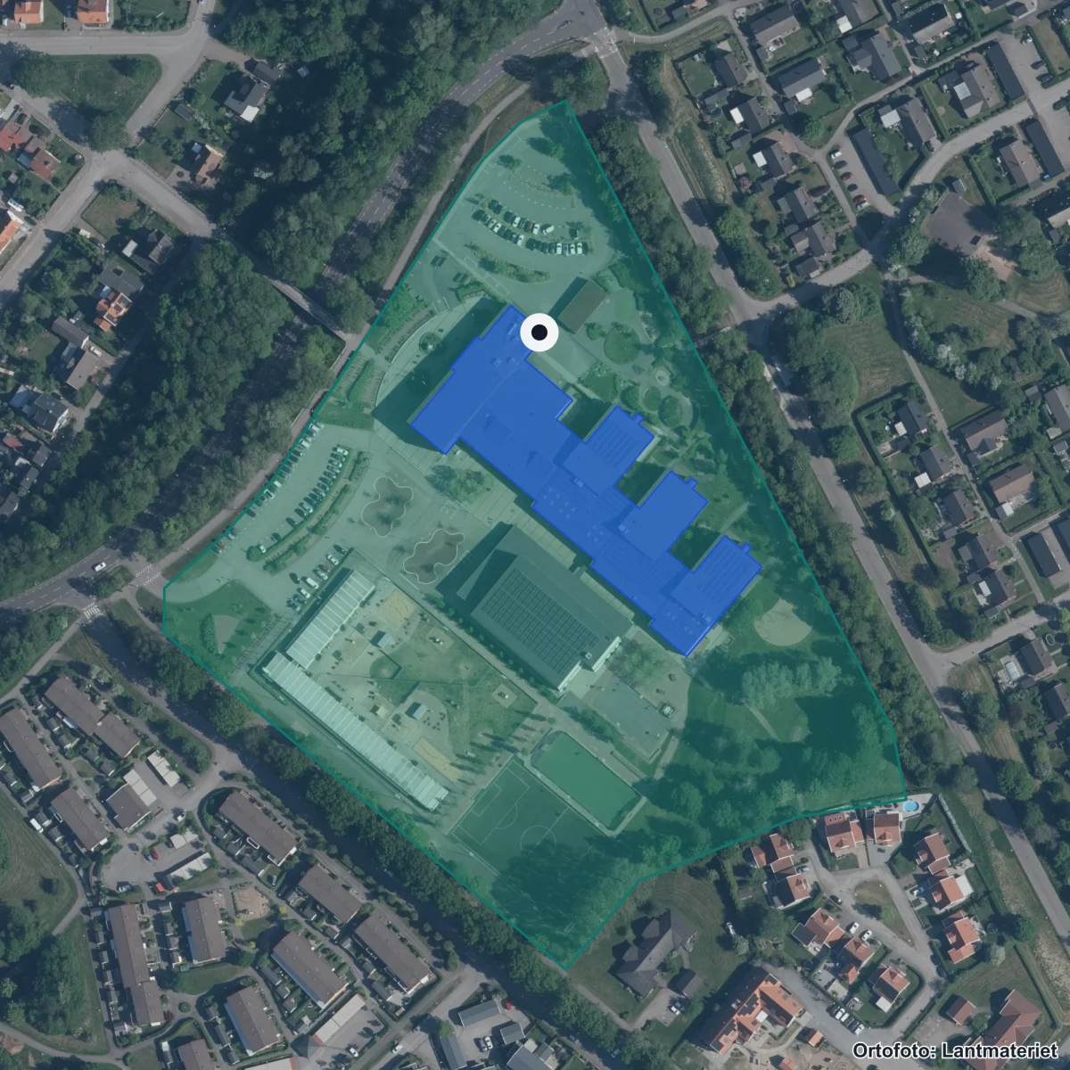 Flygbild över Anpassad grundskola Nyhem, ortofoto från Lantmäteriet