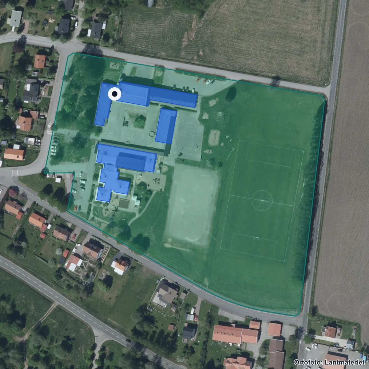 Flygbild över Moholms skola, ortofoto från Lantmäteriet