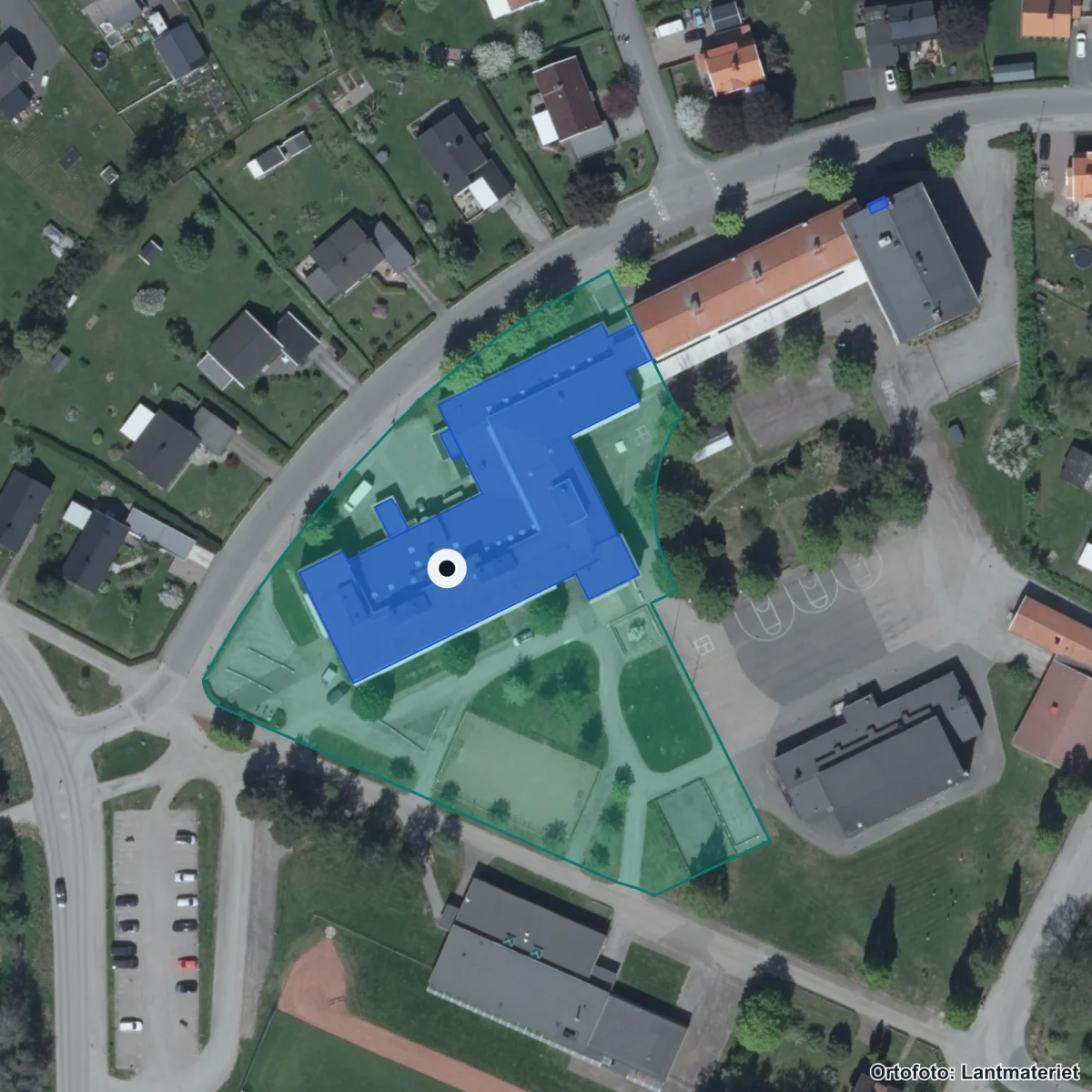 Flygbild över Olinsgymnasiet Tibro, ortofoto från Lantmäteriet